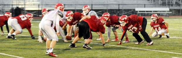 M-P goes through the motions during a rainy practice before its game against Bellevue at the Tacoma Dome Nov. 28.
