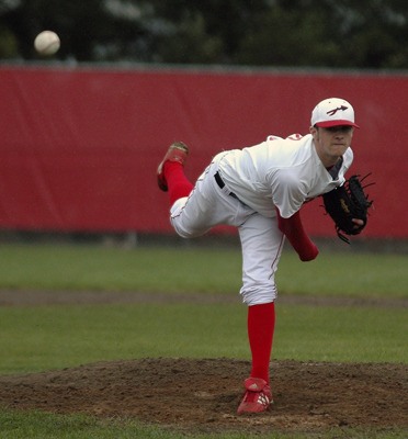 M-P senior pitcher Matt Cooper lets one go in the first inning against Cascade. The Tommies dominated the game for a 14-0 blowout.