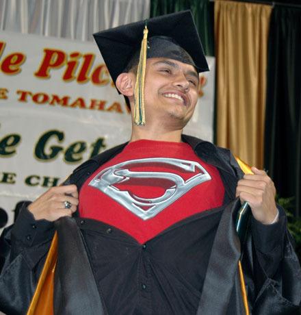 Bio-Med Academy graduate David Mendoza feels ready to leap over tall buildings in a single bound after receiving his diploma.