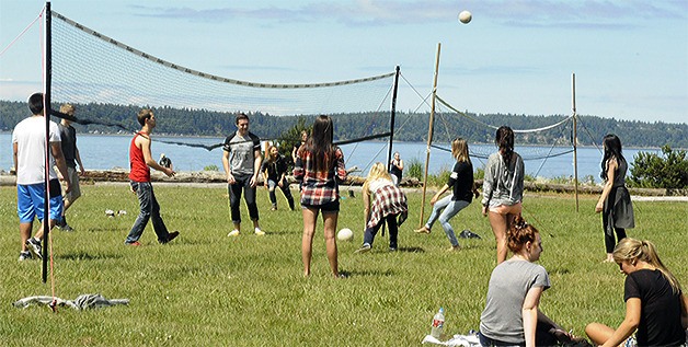 Arlington seniors play volleyball at their picnic at Kayak Point June 4. They are set to graduate June 5 at 7:30 p.m. at the high school stadium.