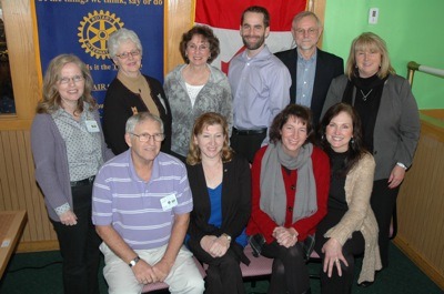 Marysville Rotarians stand with representatives of the community service organizations that received $32