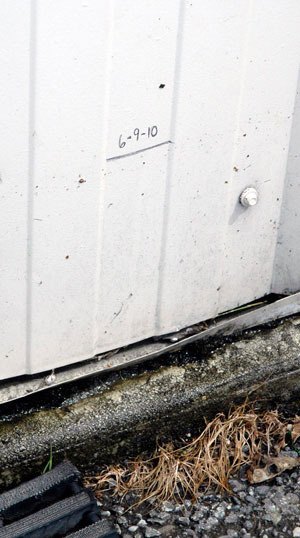 A black line near the back door of Marysville Public Works building indicates the high-water line from the flood caused by the June 10 thunderstorm.