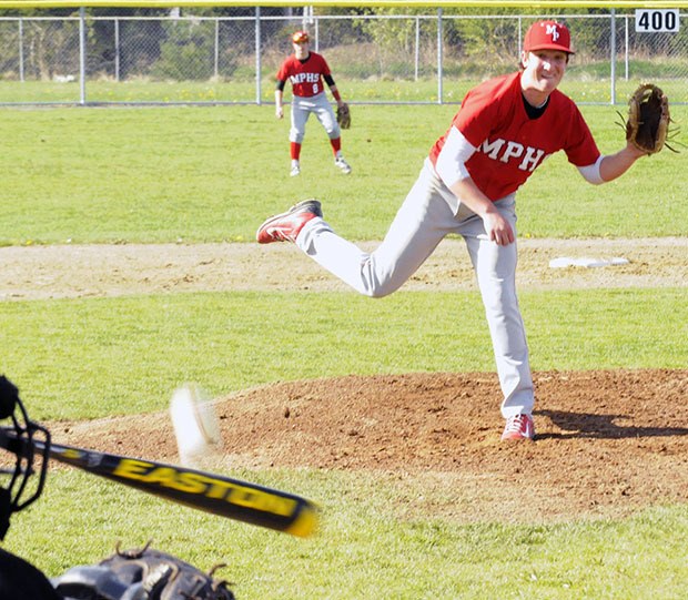 Marysville-Pilchuck's Trent Tingelstad delivers a pitch to a Marysville Getchell batter.