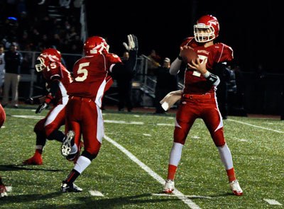M-P quarterback Jake Luton drops back to pass during the Tomahawks final game against Eastside Catholic on Saturday