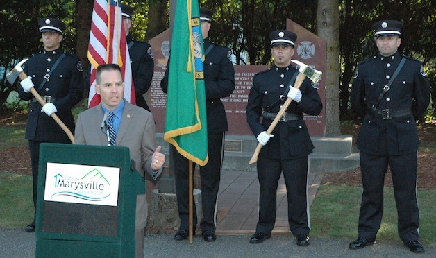Marysville Mayor Jon Nehring addresses attendees of the remembrance ceremony at the Police and Firefighters' Memorial