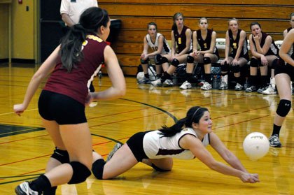 Cougars senior Allie Hernandez digs out a Mount Baker spike during the fourth game. She finished with 26 digs in two games at the District 1 tournament.