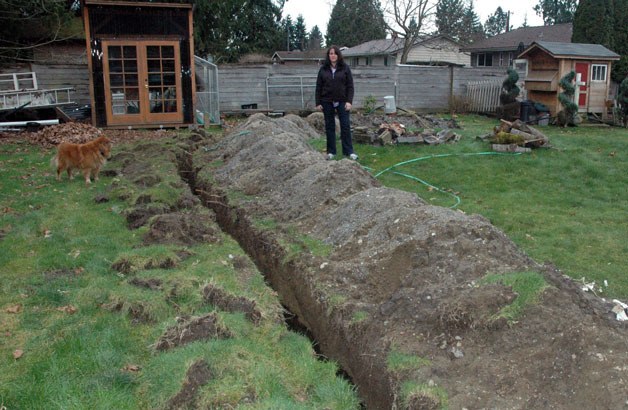 Denise Jantz’s brother dug a 60-foot-long ditch to help drain out the excess water from her backyard in the wake of her property being flooded on Jan. 28.