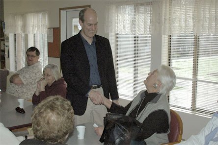 Rep. Rick Larsen shakes hands with Marysville resident JoAnn DeLazzari during the Congressman's March 5 tour of Wrobliski Manor in Arlington.