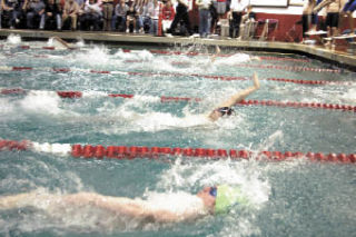 M-P senior Gabe Lopez opens the 200 medley relay with the backstroke.
