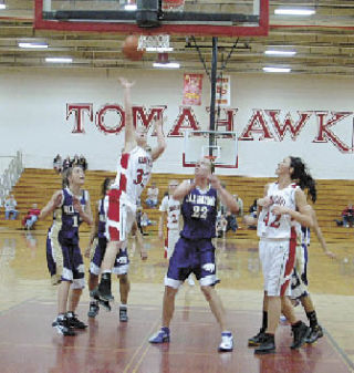 Freshman Emily Enberg earns two of her 15 points against Oak Harbor.
