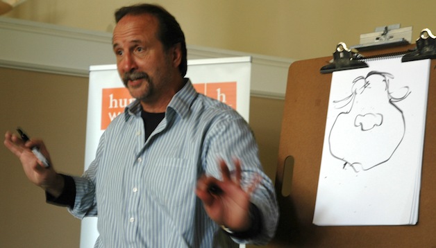 Milt Priggee demonstrates how to create a cartoon in real time at the Windsor Square Retirement Community Feb. 20.