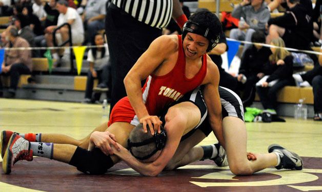M-P junior Christian Mendoza wrestles for a state bid at 125 pounds.