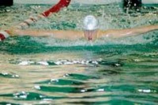 M-P sophomore Trevor LeValley uses all of his upper body strength in the 100-yard butterfly Thursday