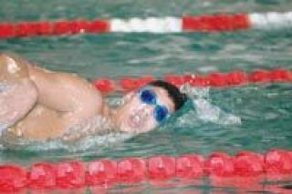 M-P sophomore Britt Mann powers his way to a third-place finish in the 500-yard freestyle Thursday