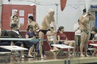Awaiting his turn at the 100 butterfly