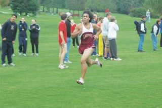Senior Terrence Ordonez sprints to the finish. He was the third senior to cross the finish line at the North County Invite and had a personal-best race