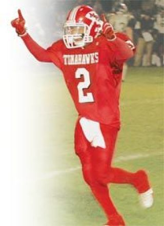 Sophomore defensive back Leandro Abadam celebrates his interception that thwarted a potential game-tying drive from Arlington late in the contest.