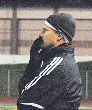 M-P soccer coach Geoff Kittle patrols the sideline during one of the Tomahawks girls soccer games. Kittle has been named to succeed Kyle Suits as the new boys soccer coach.