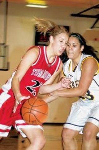 Junior forward Jessica Masters drives around an Everett defender Wednesday