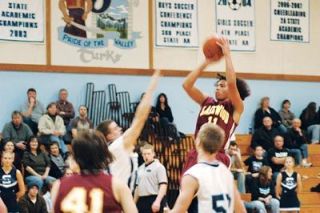 Terrence Ordonez pulls up for a jumpshot during Lakewoods 78-70 victory over Sultan. The win was Lakewoods first of the season.