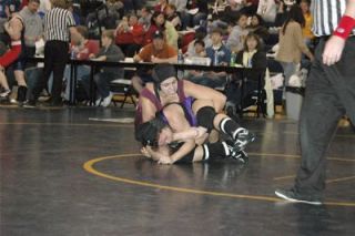 Lakewood sophomore Keely Caldwell puts the hurt on Lake Stevens senior Natasha Grow in the semifinal at 130 pounds. Caldwell won with a second-round pin