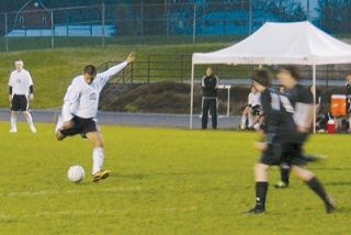 Lakewoods Evander Ochoa uncorks a shot against the Blaine Bordierites in the Cougars 6-1 victory.