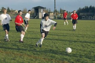 Lakewood senior Bernardo Medeiros attempts to move the ball upfield.