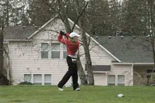 Junior Sarah Rott watches her drive from the 10th hole. In the March 17 competition