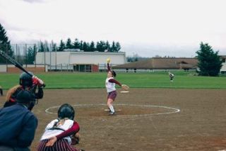 Starting pitcher Kally Behens winds up in the March 19 game between Lakewood and Granite Falls.  Behen pitched well but did not get run support to back up her effort.