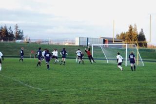 The Sultan goalkeeper snuffs out a potential Lakewood scoring opportunity.