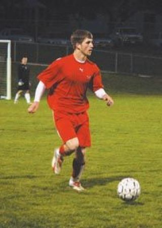 Senior midfielder Clayton West drives the ball into familiar territory as he crosses midfield and Marysville gets ready to attack.
