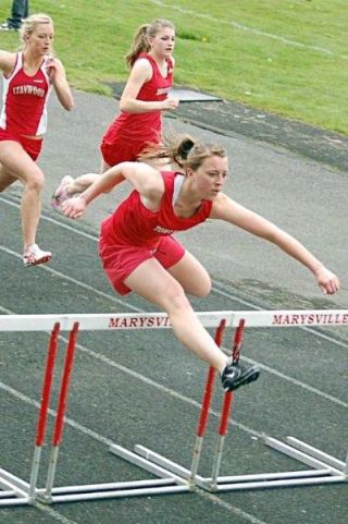 Junior Alex McDonald won the girls 100 hurdles by a healthy 1.3-second margin.