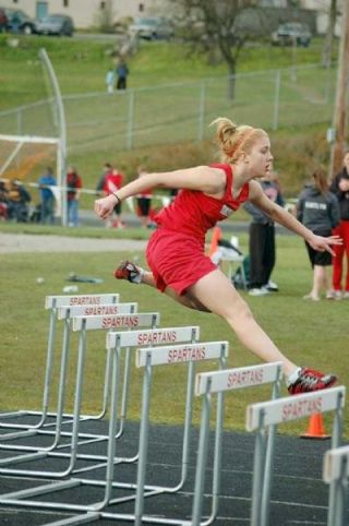 M-Ps Laina Weber competes in the 300 hurdles.