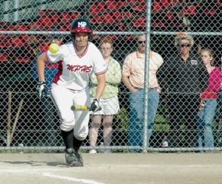 First baseman Skyler Peterson stops Snohomish runner Miranda Granger in the second inning.
