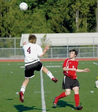 Brian Star wins a ball in midfield for Lakewood.  Star and the midfield controlled most of the action in the game.