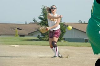 Junior pitcher Kally Behen fires a pitch in the Cougars playoff loss to Lynden.