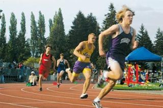 Sophomore Jacob Binder chases down Lake Stevens and Kamiak rivals for a 52.64 finish in the 400 during May 16 preliminaries.