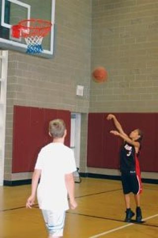 Coach Marion Green commended Bryce Vitcovichs improvement in basketball skills over his last year of training.