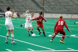 Senior midfielder Kassandra Riozzi duels with Cascade defender Desiree Pittsenbarger. Riozzi scored two goals in the Tomahawks Sept. 20 win.