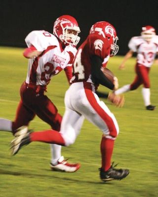 Levi Cartas takes down a Stanwood return man on