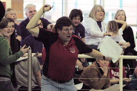 Marysville-Pilchuck coach Scott Knowles cheers on one of his racers at this year's District 1 meet.
