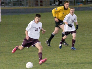 Senior Craig Hooks strides with the ball in Lakewood’s March 23 game against South Whidbey.