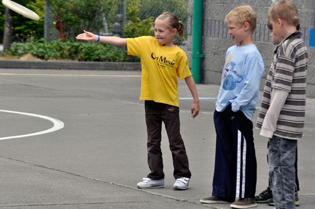 Taylor Maak throws a frisbee during the Marysville Parks and Recreation Wacky World of Sports All-Camp Olympics on Friday