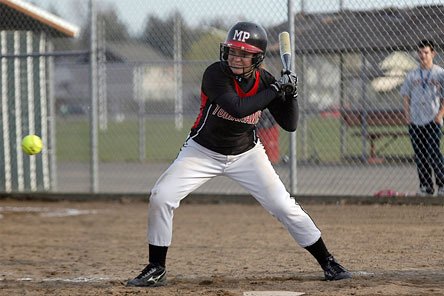 Morgan Martinis watches a pitch all the way in just before hitting her second double of the second inning.