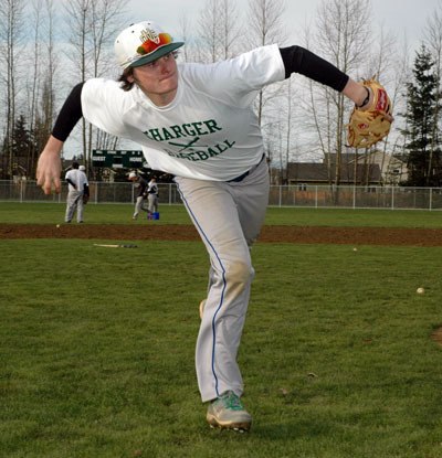 Marysville Getchell junior Brandon Bethers practices his infield throw on the Marysville-Pilchuck field.