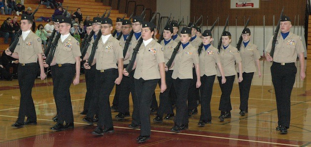 The cadets of the Marysville Naval Junior ROTC armed drill team march sharp during the first seasonal Northwest Drill and Rifle competition at Marysville-Pilchuck High School on Jan. 11.