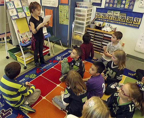 Allen Creek Elementary School second-graders read letters they wrote to the Seattle Seahawks