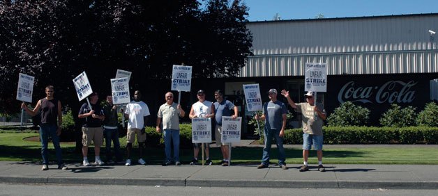 Members of Teamsters Local 38 of Marysville and Local 117 of Tukwila are picketing the Marysville Coca-Cola facility in shifts until the union and the company return to the negotiating table.