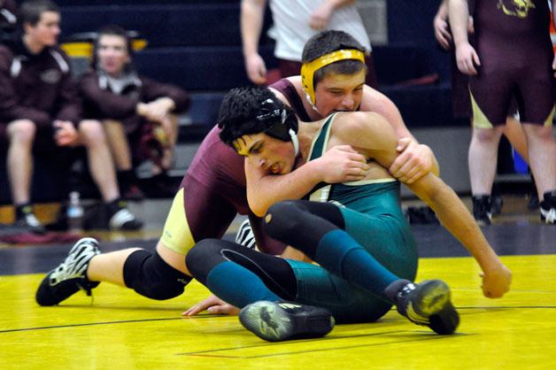 Marysville Getchell wrestler Alex Summerfield looks to gain position during a double dual at Arlington High School on Dec. 14.