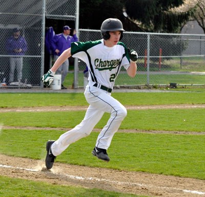 Marysville Getchell’s Collin Mahoney runs to first base during a home game against Oak Harbor on Wednesday